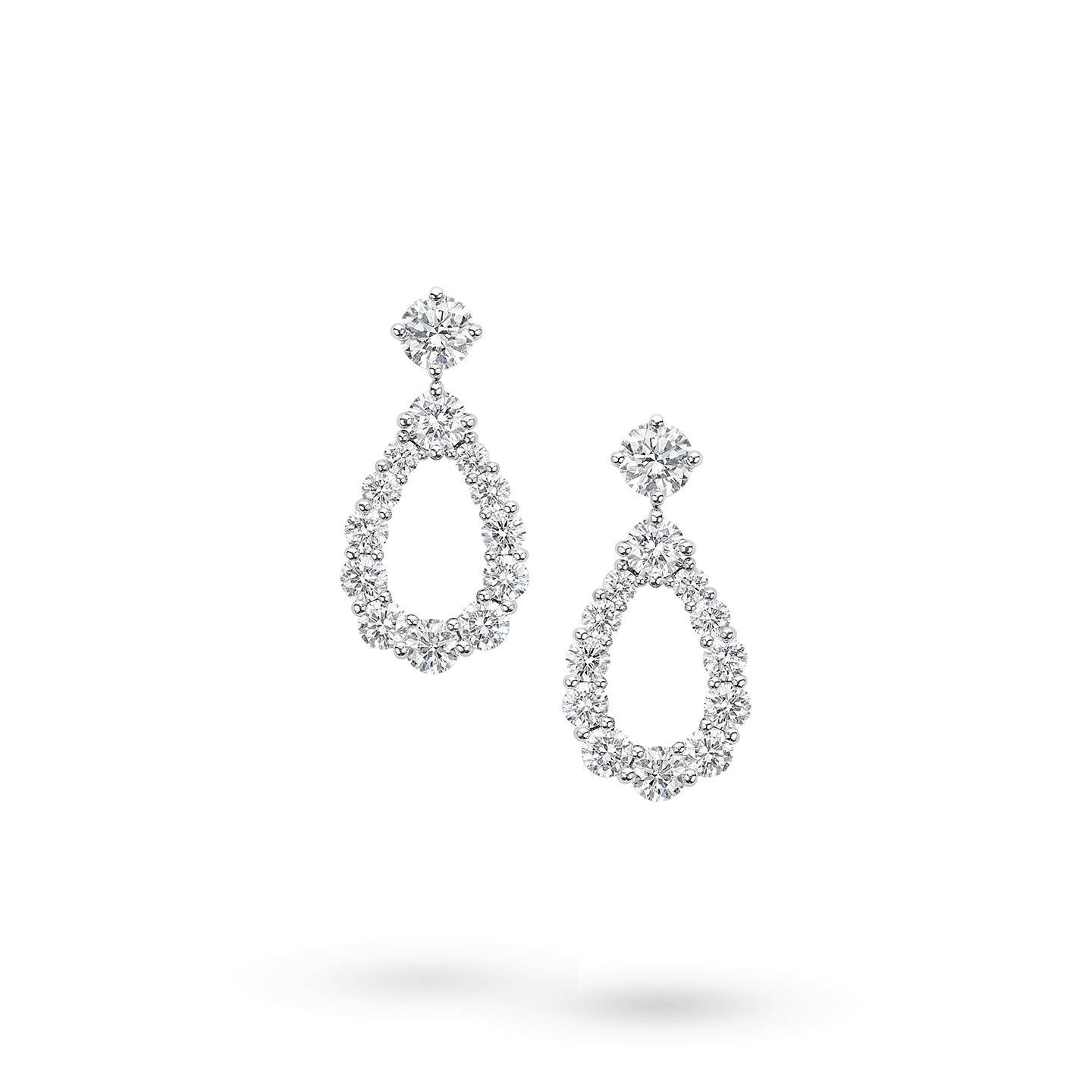 Toast to brilliance in Sparkling Cluster Diamond Earrings by HarryWinston   Ear jewelry Beautiful jewelry Jewelry
