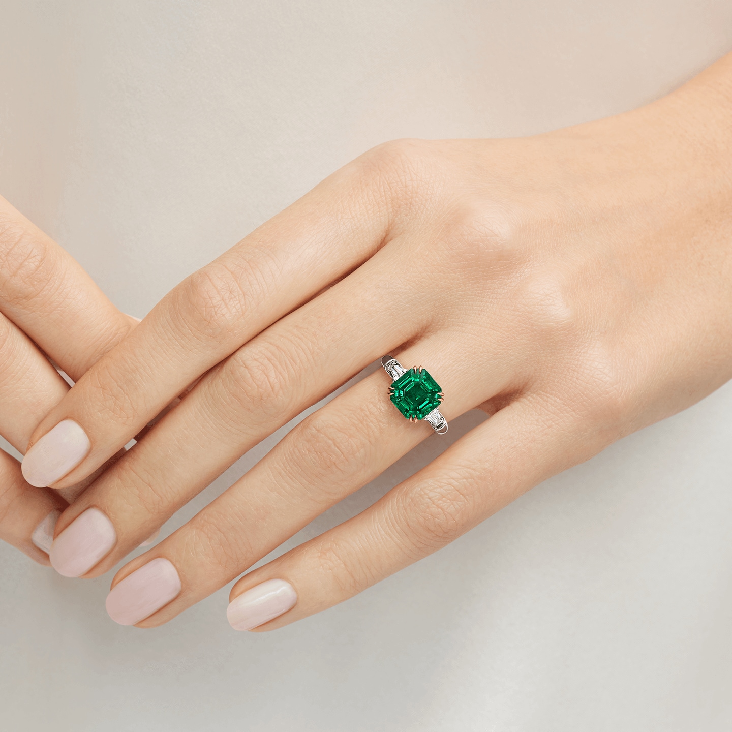 Classic Winston Emerald-Cut Emerald Ring featured on a model