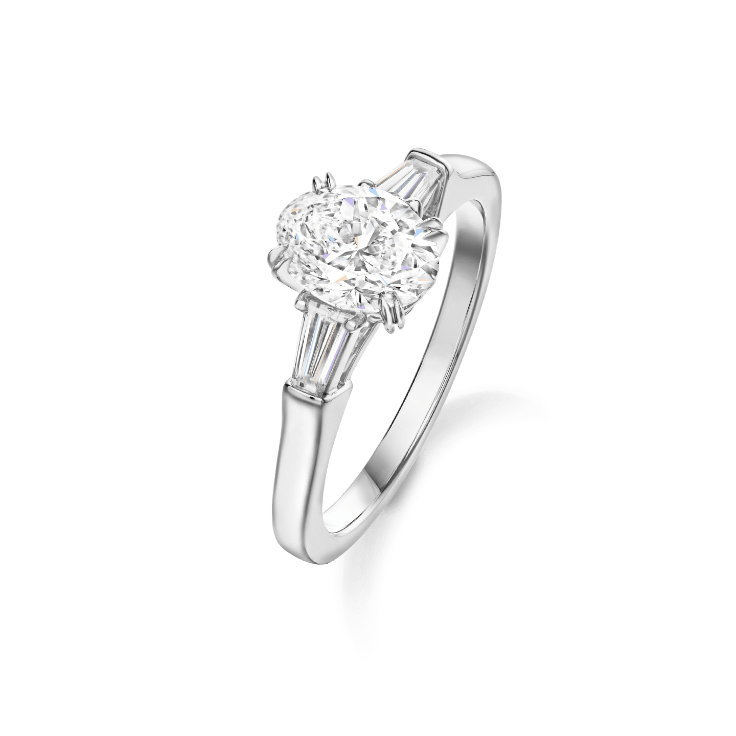 Angled view of the Classic Winston Oval-Shaped Engagement Ring with Tapered Baguette Side Stones