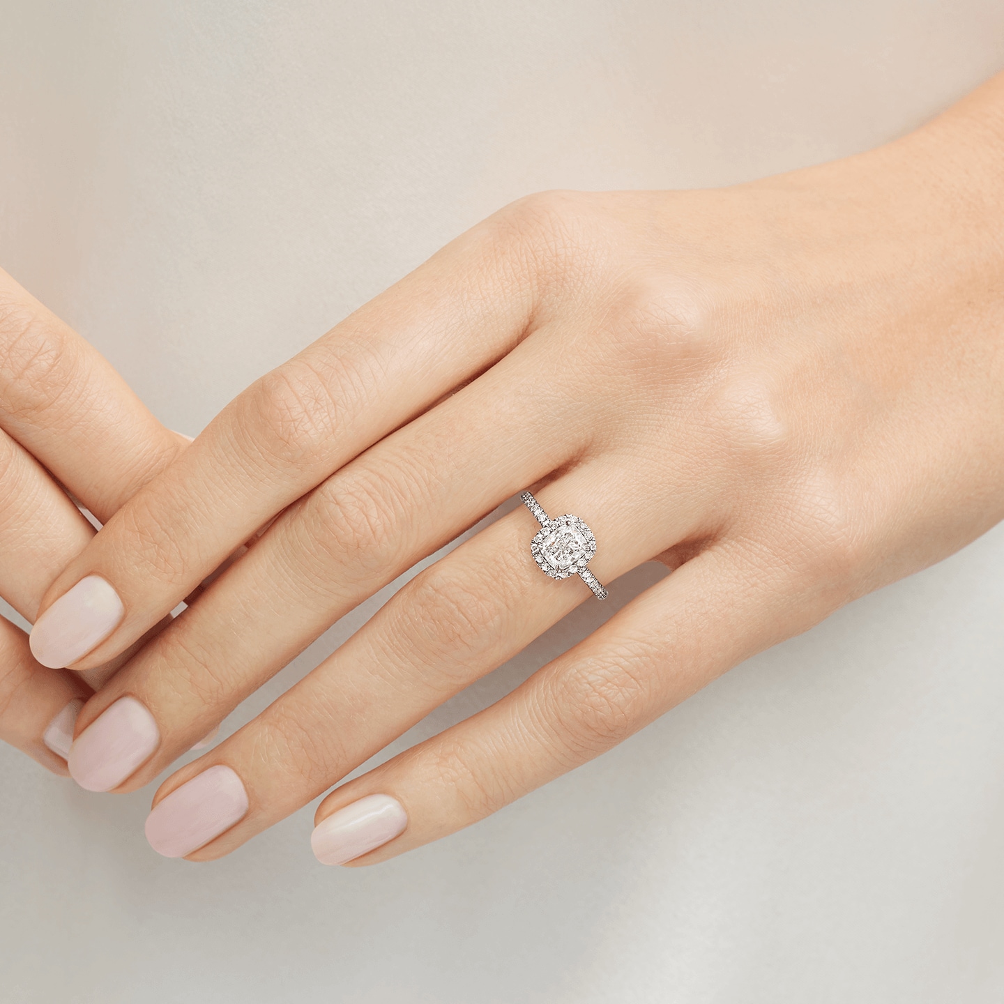 The One Cushion-Cut Diamond Micropavé Engagement Ring featured on a model