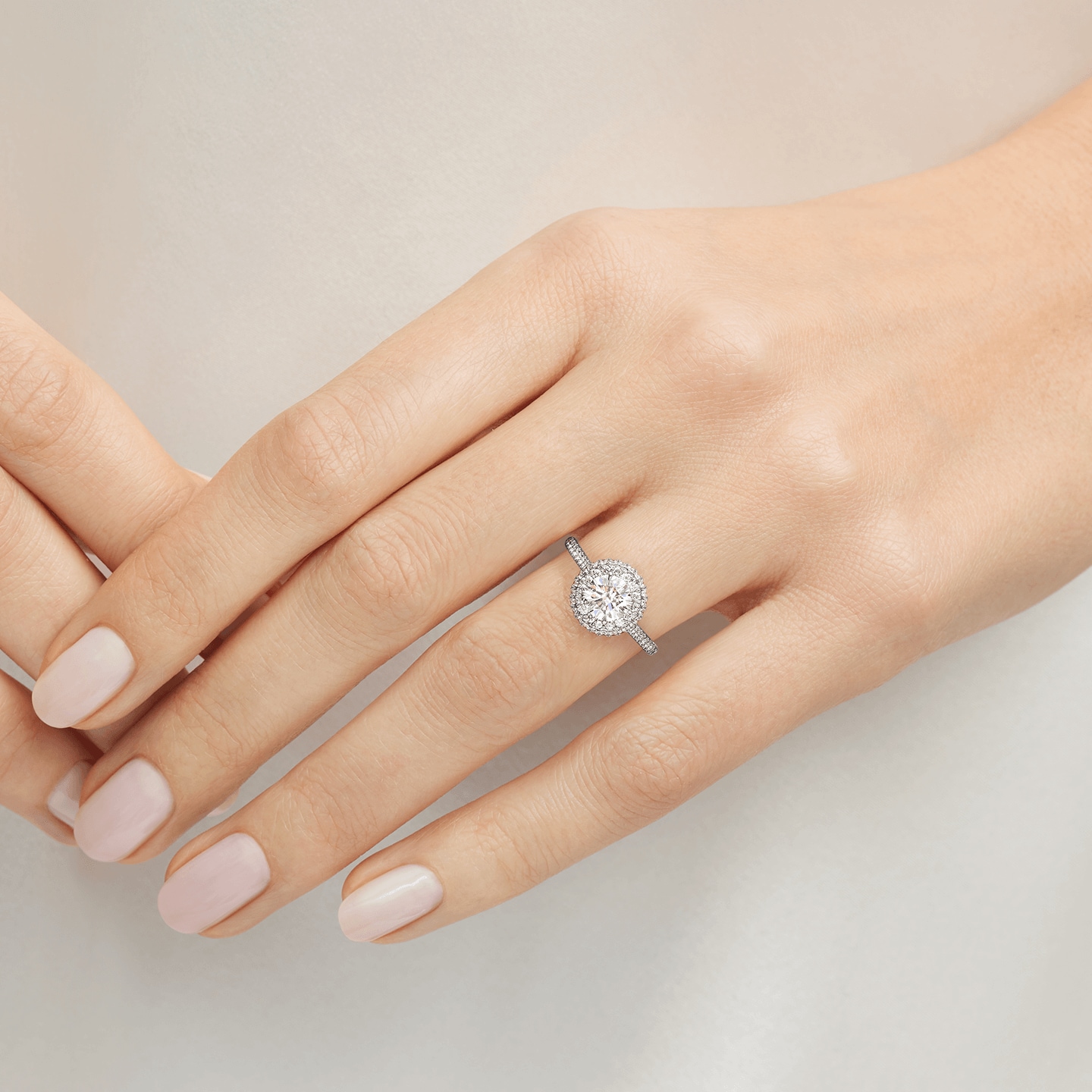 The One Double Halo Micropavé Diamond Engagement Ring featured on a model